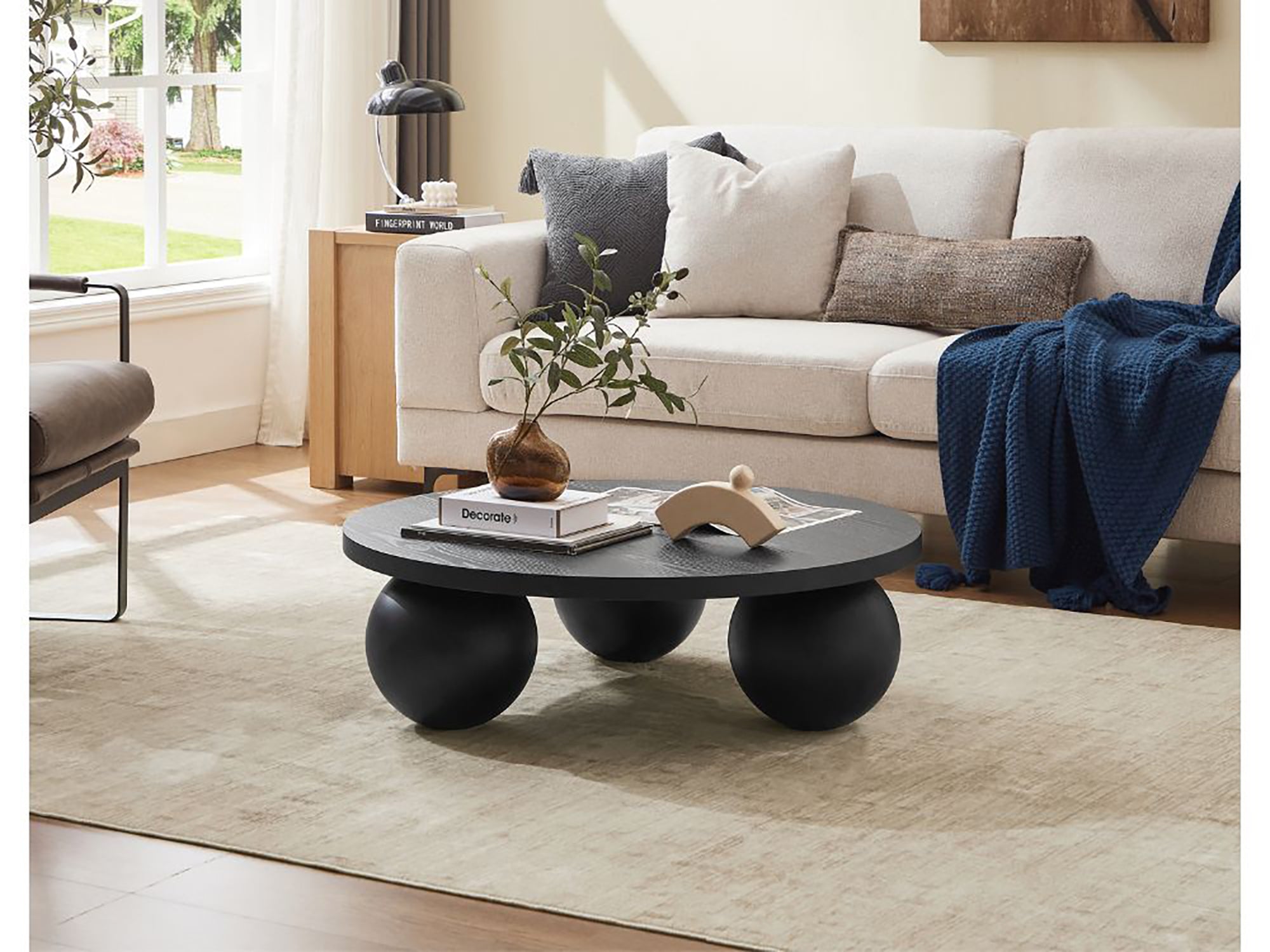 Luna Noir Round Coffee Table – Modern Elegance with Sculptural Legs (23ELG018B)